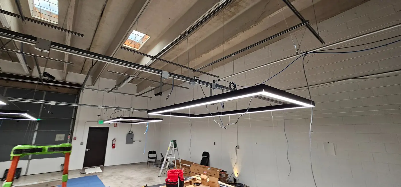 Suspended LED lighting installed for a new Colorado business