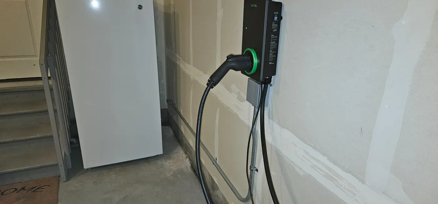 Wall-mounted EV charger with dedicated conduit