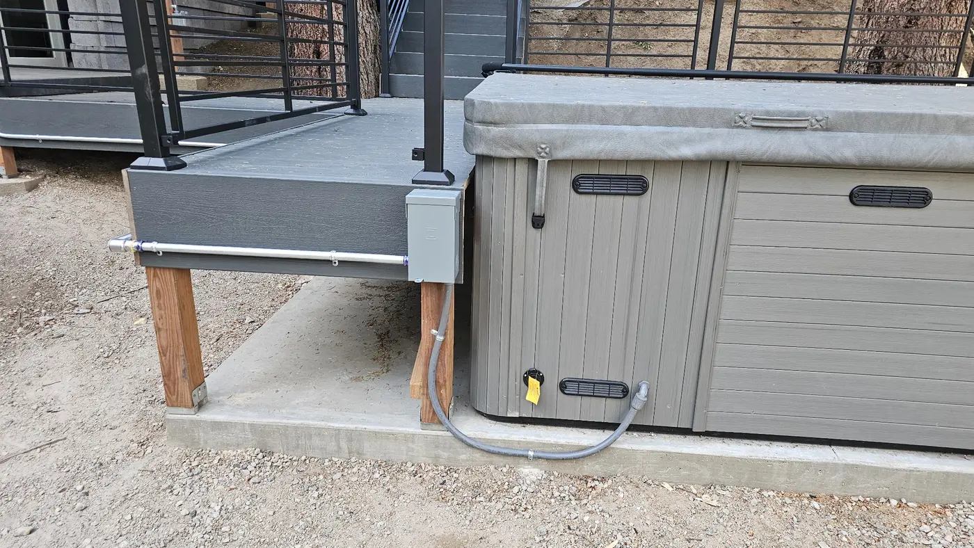 Outdoor hot tub electrical connection and disconnect